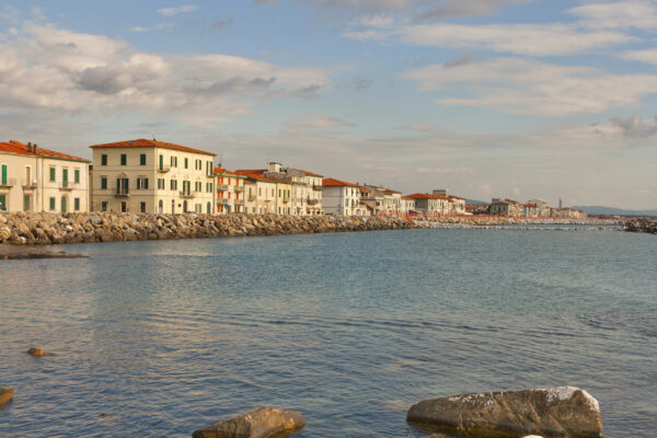 Marina di Pisa sunset view of the town waterfront. Tuscany, Italy.